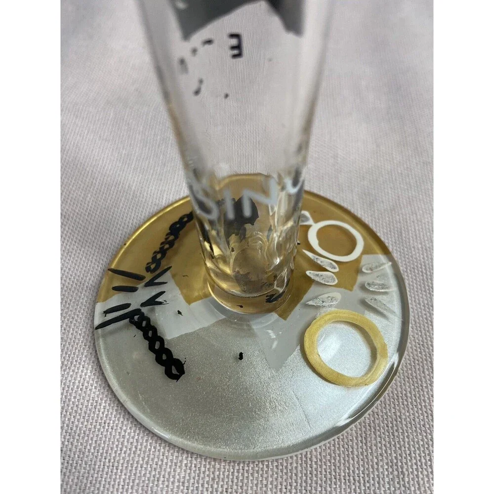 LOLITA - DIVORCE CHAMPAGNE FLUTE GLASS HAND PAINTED. SOME PAINT WEAR ON GLASS.